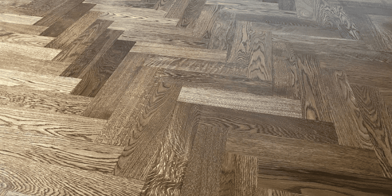 Herringbone hardwood installation and refinishing by LUKS Construction Kirkland