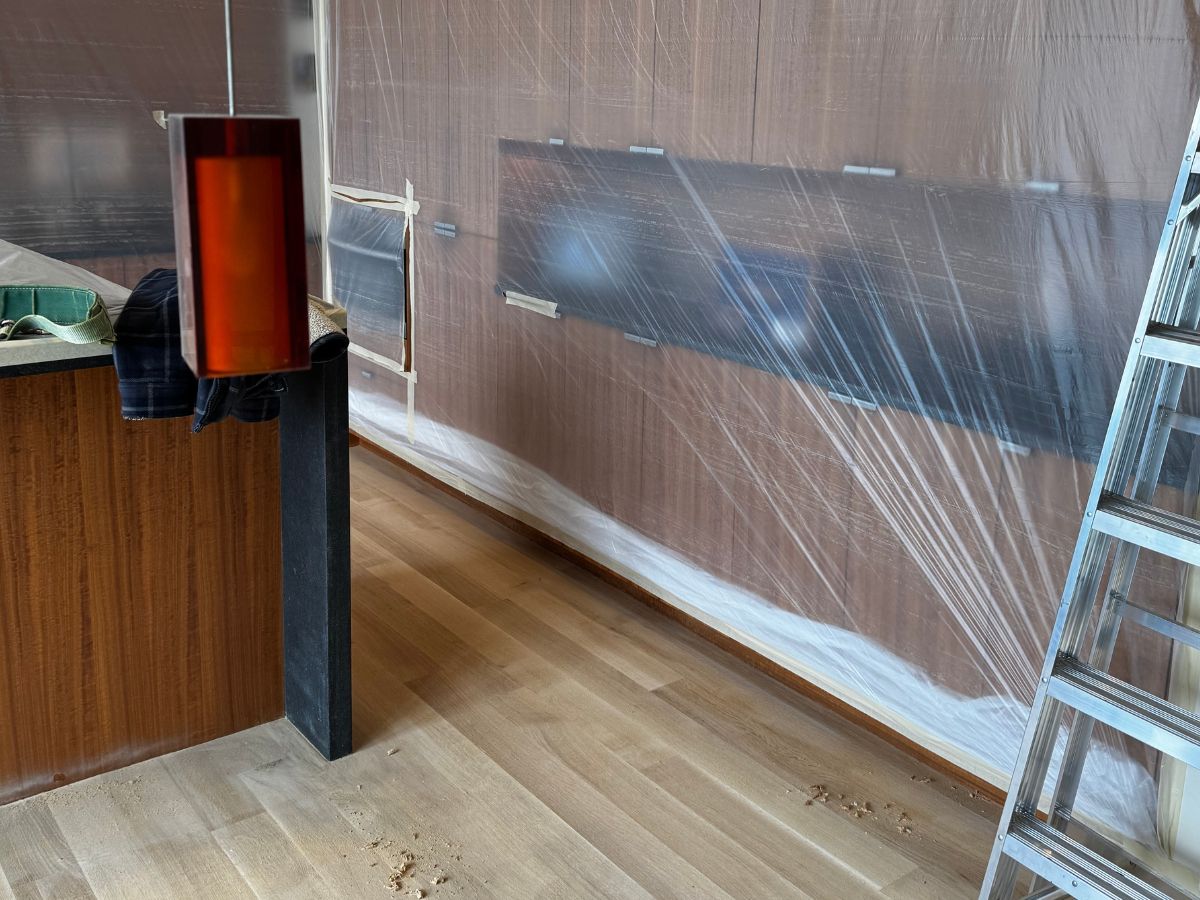 Dust control setup for hardwood floor refinishing in Seattle WA