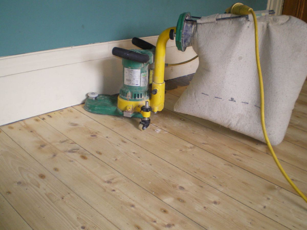 Hardwood floor edging during refinishing in Seattle WA