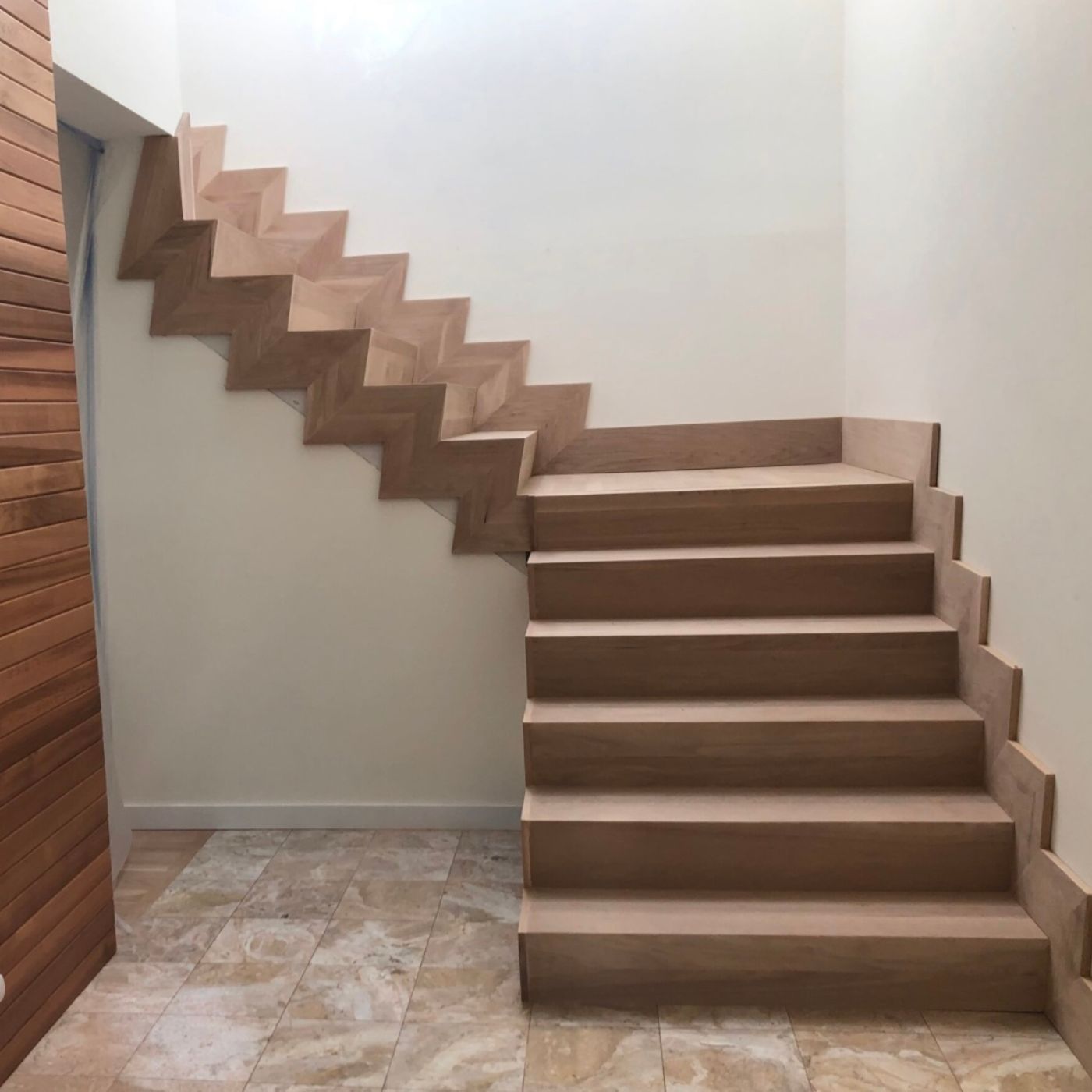 Modern hardwood stairs detail with crisp edges in Redmond WA